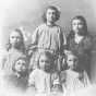 Photograph of the children of Anton and Elizabeth Gág c.1905. Back row (left to right): Stella, Debli, Wanda. Front row (left to right): Howard, Asta, Nelda.