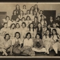 Black and white photograph of Girls’ Club doll party at West Side Neighborhood House, St. Paul, 1919.