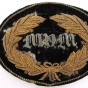 United States Army General and Staff officers hat insignia worn during the Civil War by General John B. Sanborn of the 4th Minnesota Regiment. The velvet patch is embroidered in bullion with a wreath and the letters "MVM" (Minnesota Volunteer Militia).