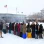 Tibetan Minnesotans perform an incense-burning ceremony for the wellbeing and health of their spiritual leader, His Holiness the Dalai Lama at the Tibetan American Foundation of Minnesota in St. Paul, ca. 2018. Photograph by Tashi Khongtsotsang. 