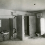 Black and white photograph of a the mail carrier’s (men’s) toilet inside the Anoka Post Office, January 11, 1917. 