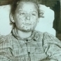 Black and white photograph of a juvenile female smallpox victim taken c.1900.