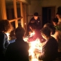 Color image of Mayim Rabim Congregation members gathered to celebrate Chanukah, 2013. 