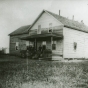 Black and white photograph of the first school at St. Mary's Mission, Red Lake, Minnesota, c.1880s.