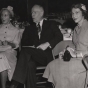 Black and white photograph of Ruth Melamond, Dr. Owen Wangensteen, and Luella Maslon at a Mount Sinai Women's Auxiliary function, 1952.