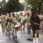 Color image of the Sabathanites Drum Corps marching in parade in Minneapolis, ca. early 2000s. Photographed by Suluki Fardan.  