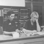 Gratia A. Countryman at desk in Minneapolis Public Library
