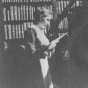 Gratia Countryman, librarian, in library stacks
