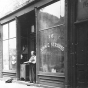 John E. Strauss, Sr. in front of Strauss Skate Shop