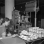 Women packing Red Mill cheese products
