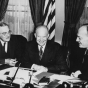 Black and white photograph of Harold E. Stassen, John Foster Dulles, and Dwight D. Eisenhower, c.1953.