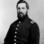 Black and white photograph of Merrill Dwelle, member of the Second Company of Minnesota Sharpshooters, c.1864. Photograph by Joel Emmons Whitney.