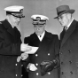 Black and white photograph of William Frederick Hasley with Harold E. Stassen and Edward J. Thye, 1945.