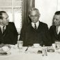 Black and white photograph of Howard Kahn, City Editor of the St. Paul Daily News (far right) with Webb Miller of United Press (center) and J. N. Jackson, President of the St. Paul Association