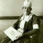 Black and white photograph of Theresa Ericksen promoting Christmas Seals in the battle against tuberculosis, ca. 1924. 