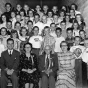 Black and white photograph of Edward F. Waite posed with students at Waite Park School, c.1955.