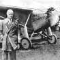 Black and white photograph of Charles Augustus Lindbergh with the "Spirit of St. Louis," c.1927.