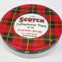 photograph of a red plaid scotch tape container
