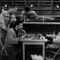 Max Shulman (seated) on the set of The Many Loves of Dobie Gillis, with Dwayne Hickman (left) and Bob Denver (above), ca. 1960, courtesy of Martha Rose Shulman.