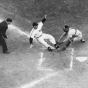 A Rox player slides home in an exciting play captured by St. Cloud Times photographer Myron Hall, c.1949. From the Myron Hall Collection, Stearns History Museum and Research Center, St. Cloud.