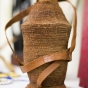 Photograph of a dhiil qaba ah (dee-l ka-ba ɑh; woven milk vessel)