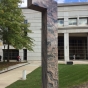 Color image of a sculpture made out of Morton gneiss in front of the Harold Stassen Building in St. Paul, 2016. Photographed by Paul Nelson.