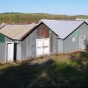 Color image of the Stuntz Bay boathouses on Lake Vermilion, Soudan Underground Mine State Park, 2011.