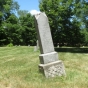 Color image of a tilted headstone in Pioneers and Soldiers Memorial Cemetery Cemetery in Minneapolis, 2016. Photographed by Paul Nelson.