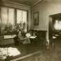 Black and white photograph of Swan Turnblad in his office at the Svenska Amerikanska Posten, ca. 1920.