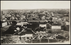 Black-and-white photo print of downtown St. Paul in 1857.