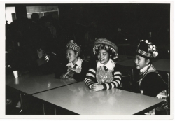Black and white photograph of the 1981 Hmong New Year, held in St. Paul’s Highland Junior-Senior High School. Photographed by Marlin Heise on December 19, 1981.