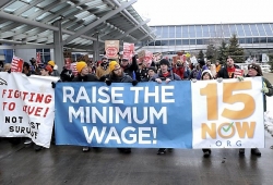 : Demonstration, led by 15 Now Minnesota, for higher pay and better working conditions at the Minneapolis-St. Paul International Airport, December 2014. Used with the permission of 15 Now Minnesota; photographer unknown. Photograph by Ginger Jentzen; used with the permission of Ginger Jentzen.