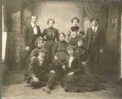 Black and white photograph of Mrs. Schmitt and family, c.1895.