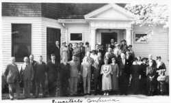 Members and staff of the Minnesota Board of Control in Faribault, 1936. Fourteenth from the left in the bottom row is Mildred Thomson.