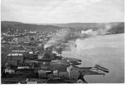 Late 1860s photograph showing barges along Red Wing's Mississippi River waterfront awaiting wheat for shipment to customers downriver.