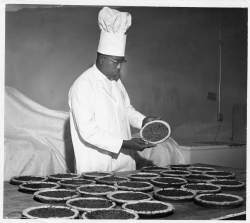 Oscar C. Howard with pecan pies, ca. 1950s. From “Cafeteria and Industrial Catering Business” in the Oscar C. Howard papers (P1842), Manuscripts Collection, Minnesota Historical Society.