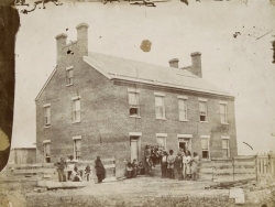 Black-and-white photo print of the Ho-Chunk (Winnebago) Indian Agency, c.1860.