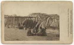 Black-and-white photograph of a Ho-Chunk (Winnebago) encampment taken by Whitney's Gallery, c.1865.