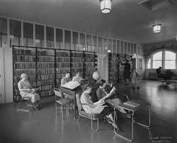Black and white photograph of women reading in library, Rochester State Hospital, c.1930.