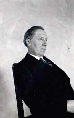 Black and white photograph of Joseph Gilbert seated, c.1925. 