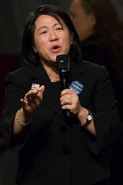 Color image of Minnesota state senator Mee Moua speaks at a rally on October 30, 2008, in support of Barack Obama, Al Franken, and other Democratic candidates.