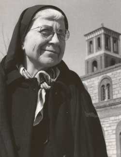 Black and white photograph of Alice Gustava Smith (Sister Maris Stella) at Our Lady of Victory Chapel on the campus of the College of St. Catherine, c.1970. 