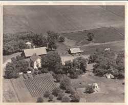 Black and white photograph of the Wiens family homestead, ca. 1950s