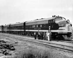George E. Mackinnon with train crew