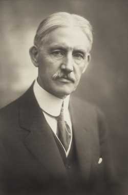 Black and white photograph of Clarence Johnston, ca. 1919. 