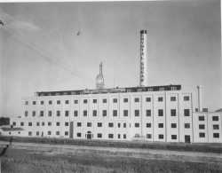 Black and white photograph of an exterior view of the American Crystal Sugar factory in Chaska. Date and photographer unknown.