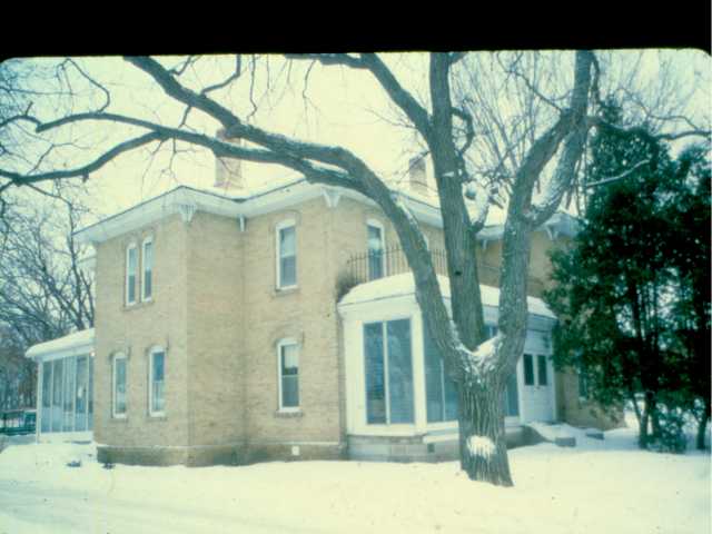 A photograph of the Porter Kelsey House showing the light color of the Kelsey brick used to build the house. Photographer and date unknown. Anoka County Historical Society, Object ID# 0000.0000.325.