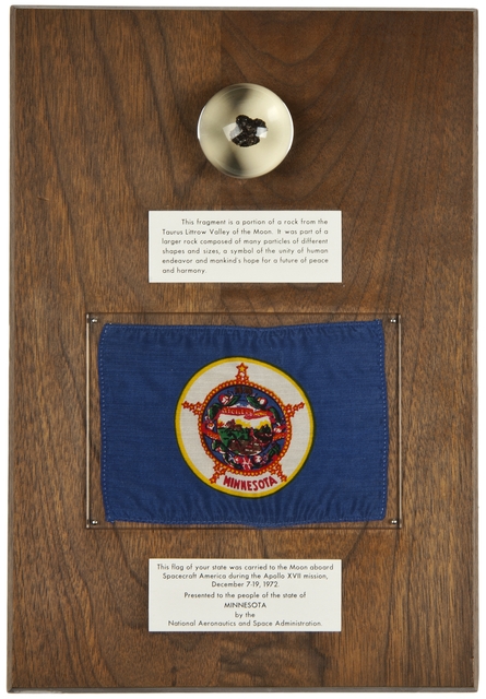 Apollo 17 moon rock and Minnesota state flag plaque 