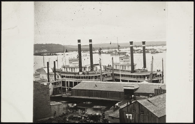 Black and white photo print of the steamboats Itasca and War Eagle at the St. Paul levee, 1859.