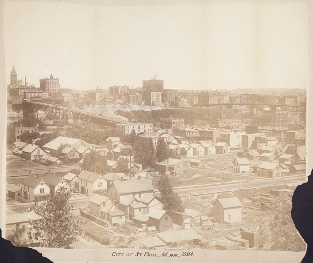 Black and white photograph of the West Side Flats and Wabasha Bridge, 1904.